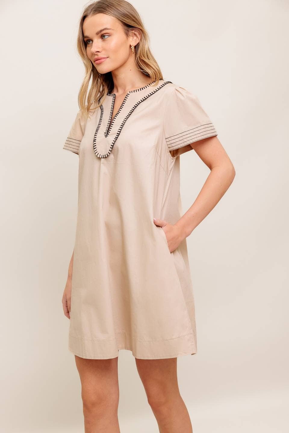 A solid woven mini dress