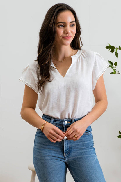SPLIT NECK PETAL TASSEL SLEEVE BLOUSE
