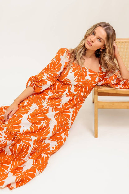 A printed woven midi dress