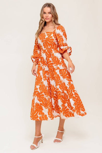 A printed woven midi dress
