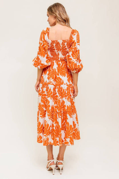 A printed woven midi dress
