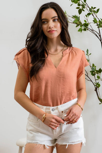 SPLIT NECK PETAL TASSEL SLEEVE BLOUSE
