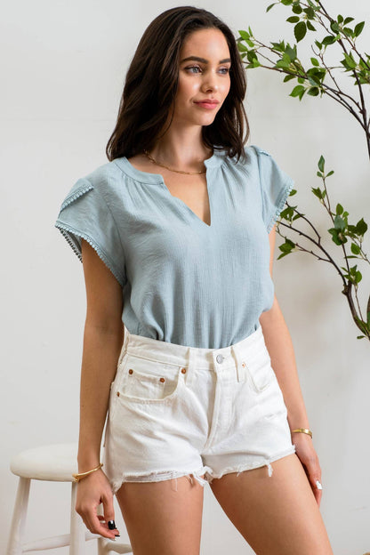 SPLIT NECK PETAL TASSEL SLEEVE BLOUSE